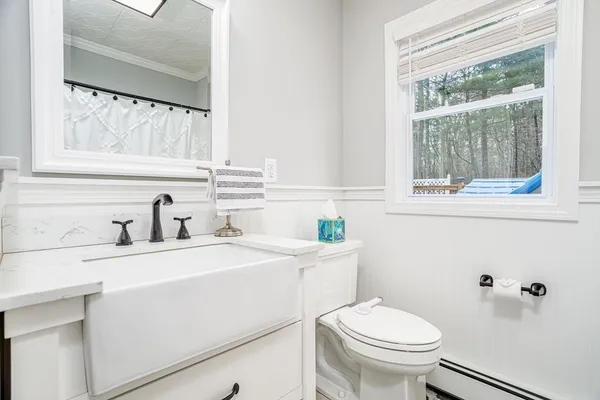 a kitchen with stainless steel appliances granite countertop a stove sink and cabinets