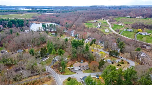 an aerial view of residential house with outdoor space
