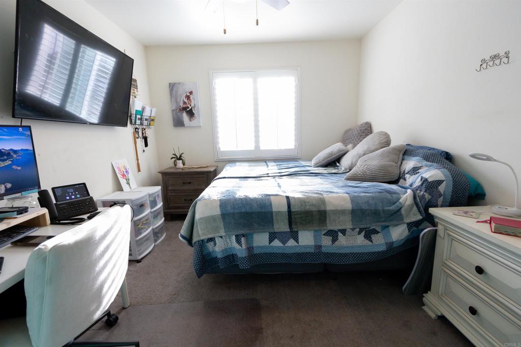32097 Rambling Court Winchester, CA 92596 - Photo 17 of 62 a bedroom with bed and a window