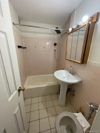 an entryway with a mirror