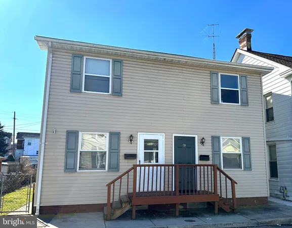 a view of a house with a deck and deck