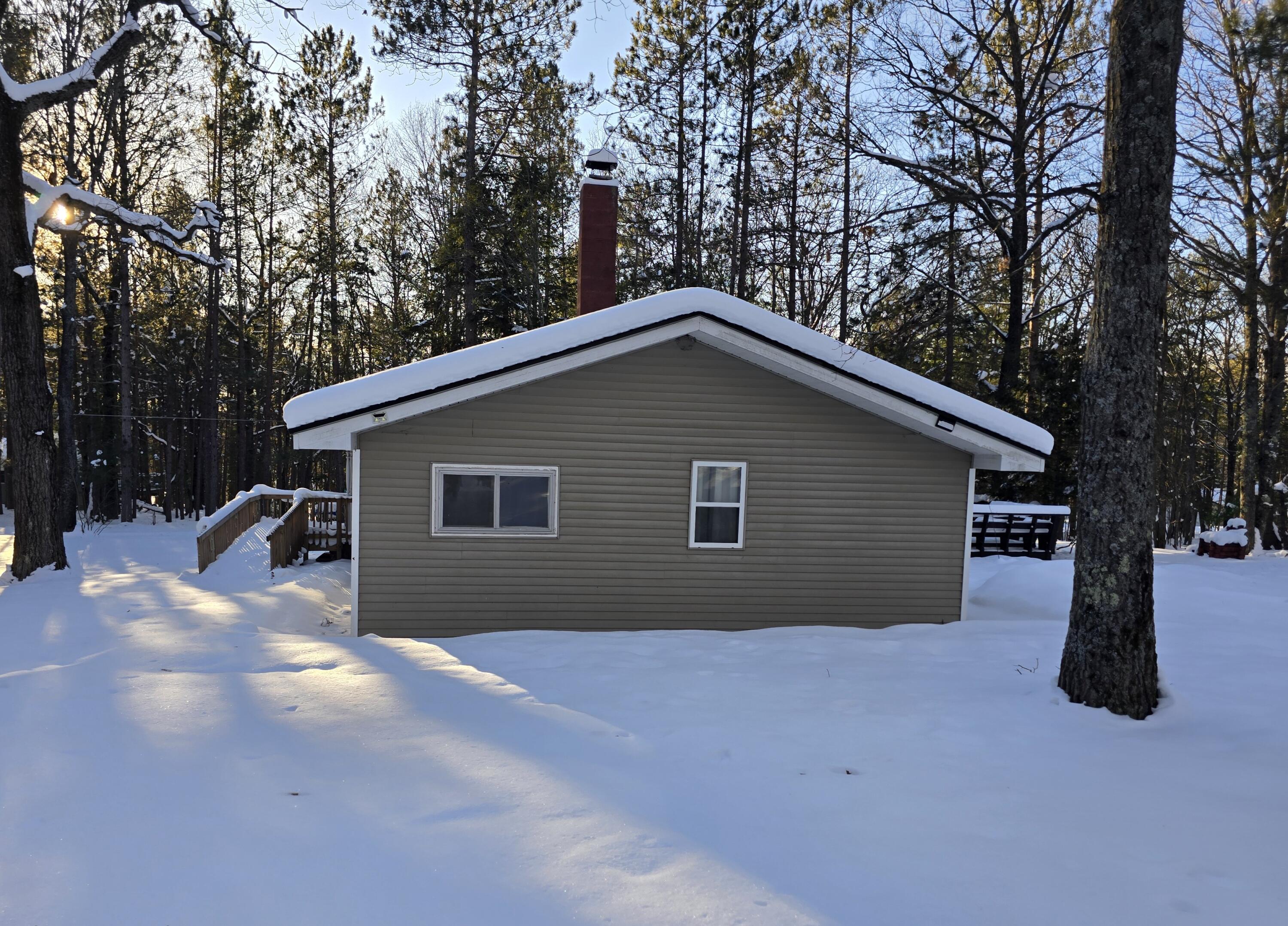 82 Forest Road Kalkaska, MI 49646 - Photo 4 of 27 North Side of House
