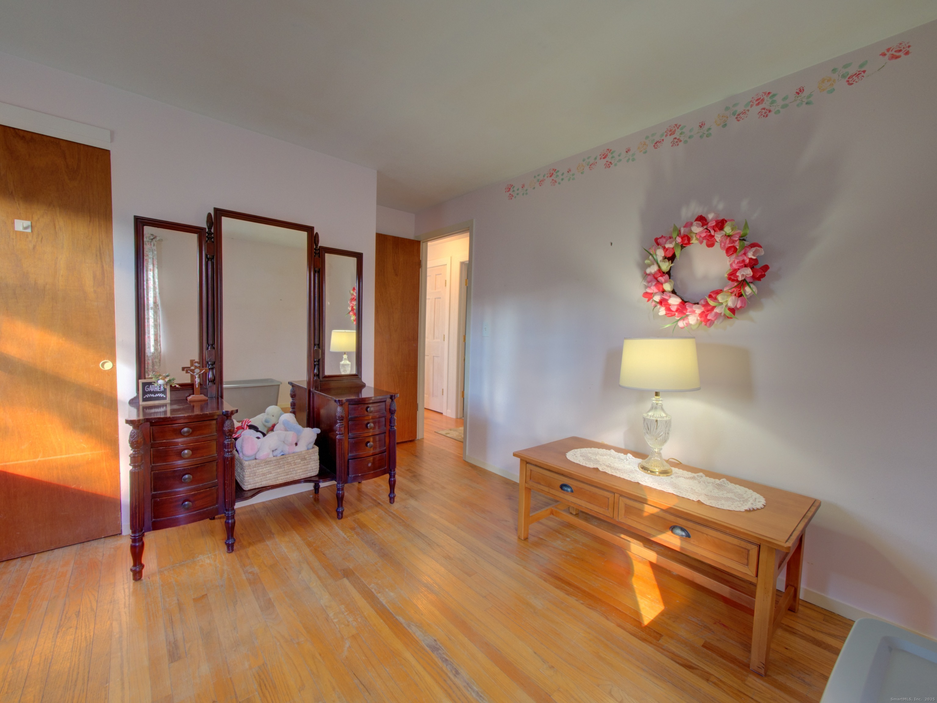 5 Sachem Lane Ledyard, CT 06339 - Photo 13 of 36 a living room with furniture and wooden floor
