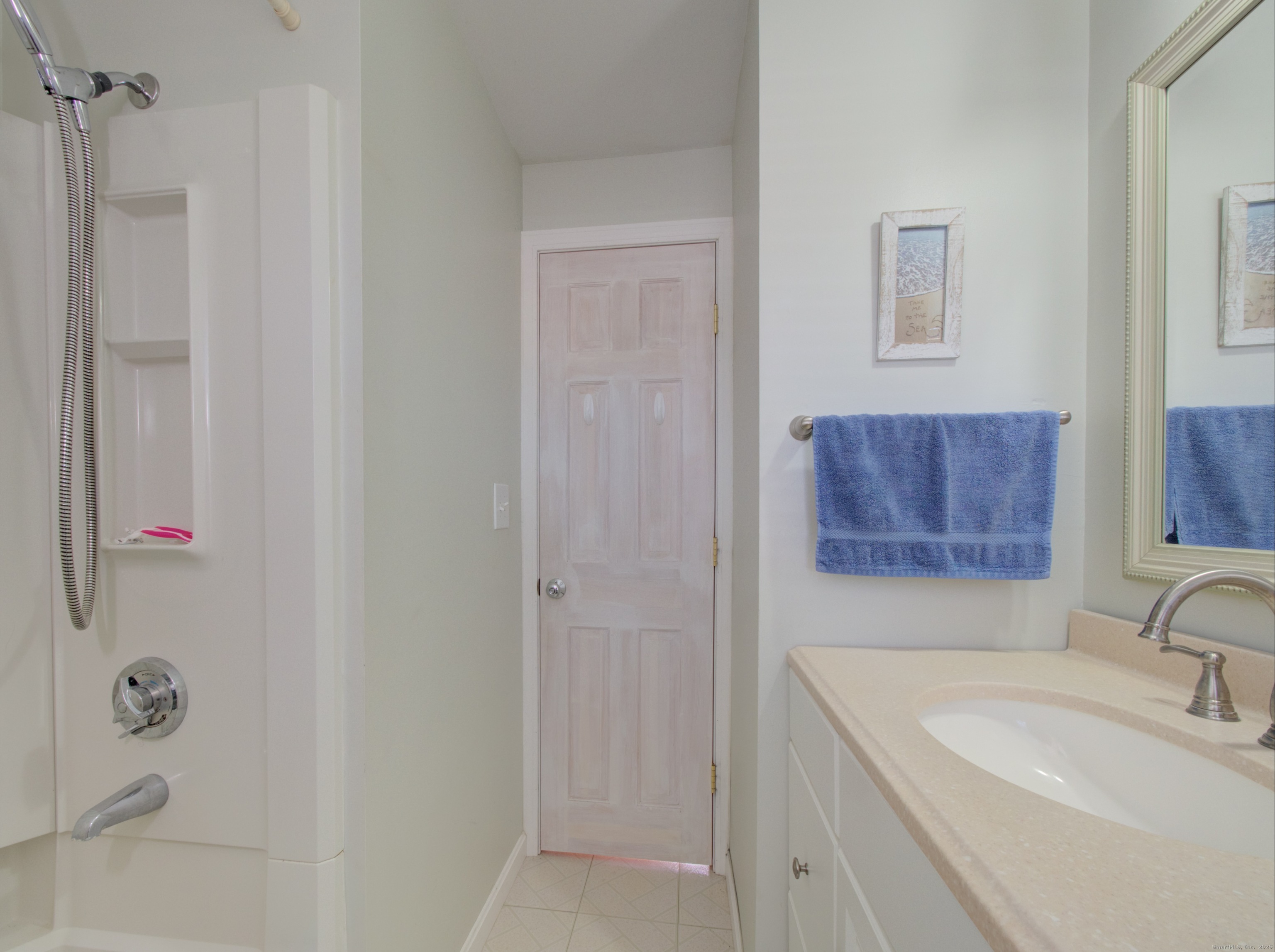 5 Sachem Lane Ledyard, CT 06339 - Photo 17 of 36 a bathroom with a sink and a mirror
