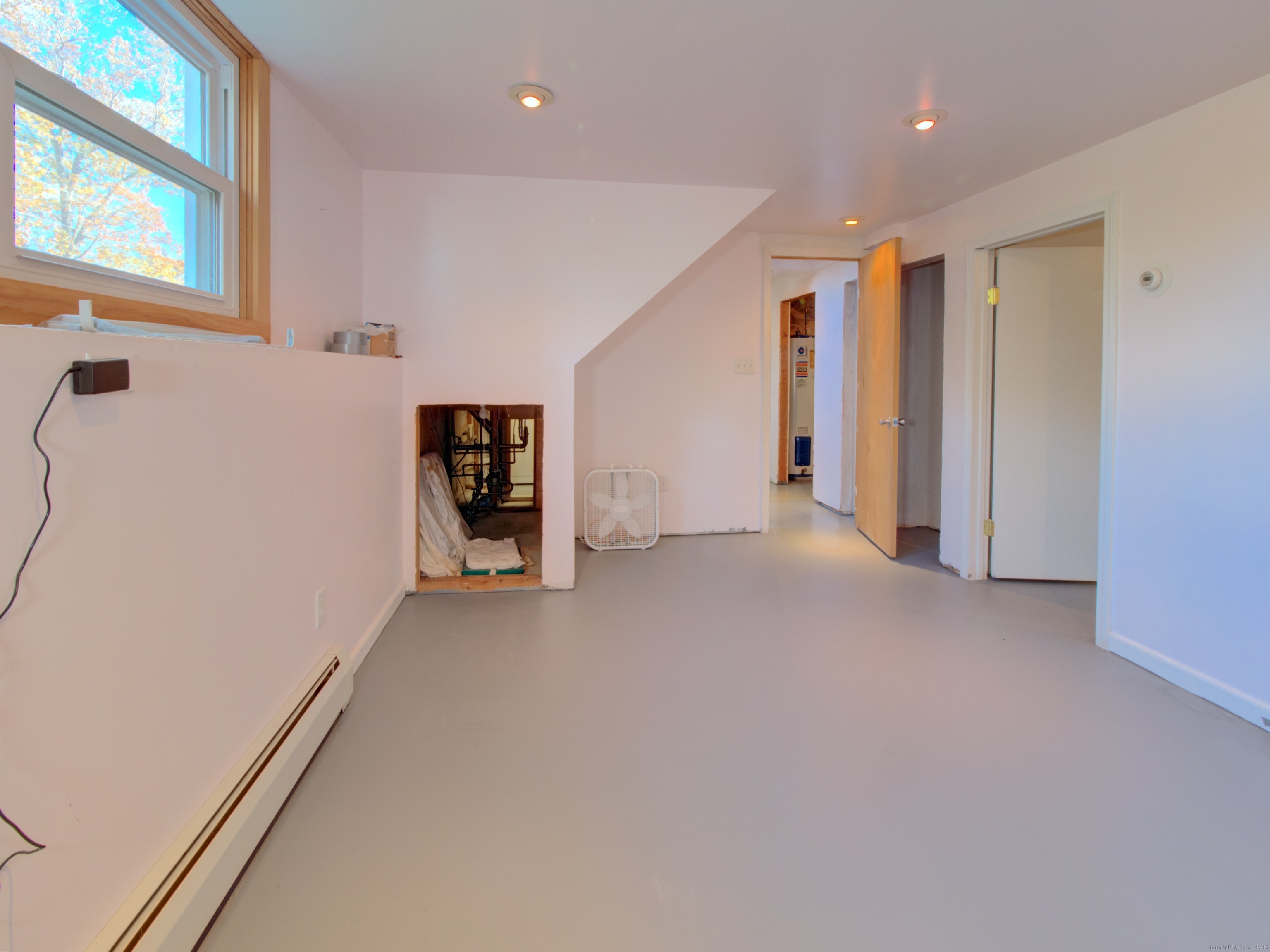 5 Sachem Lane Ledyard, CT 06339 - Photo 20 of 36 a view of an empty room with a window