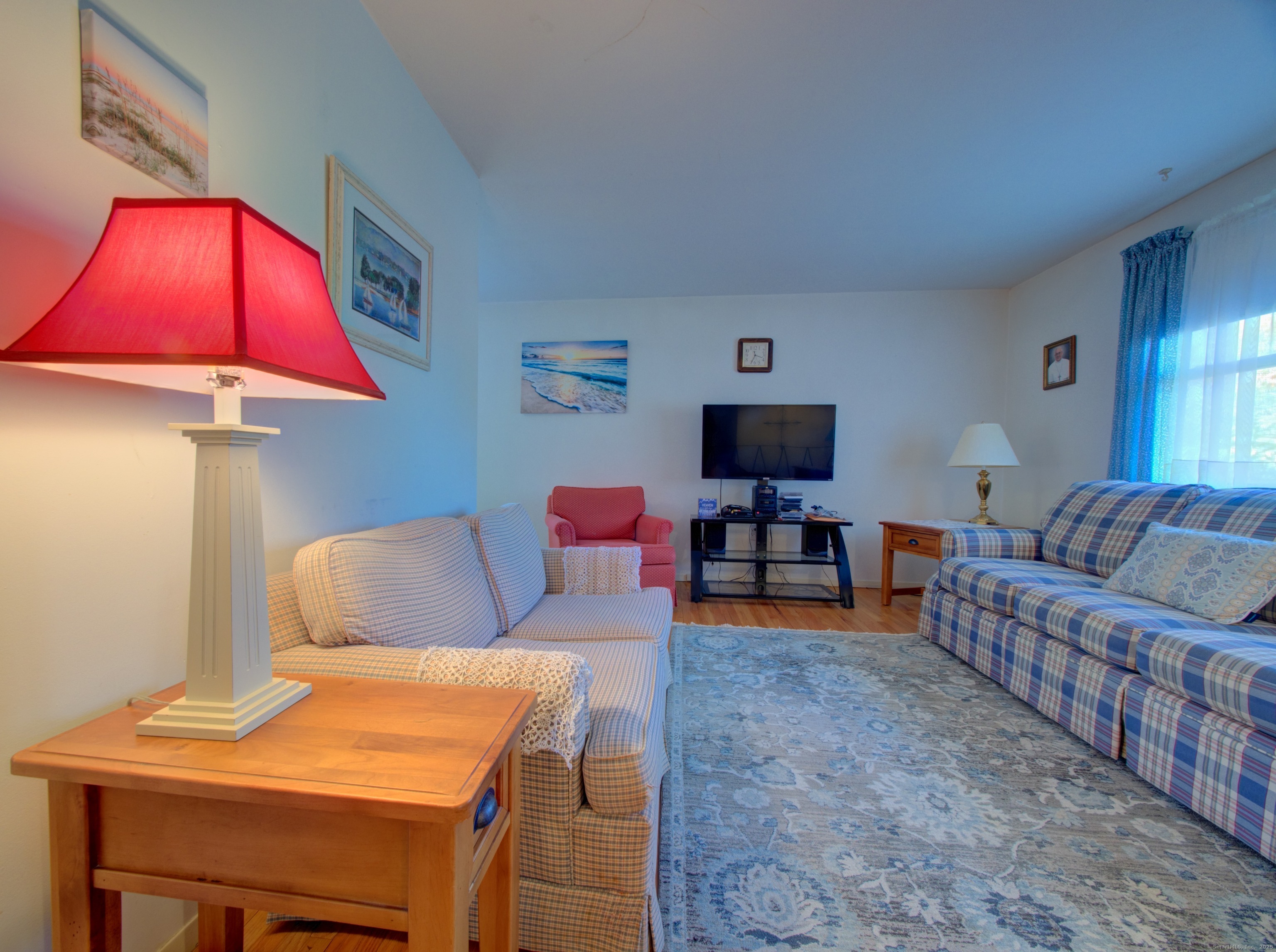 5 Sachem Lane Ledyard, CT 06339 - Photo 2 of 36 a living room with furniture and a flat screen tv