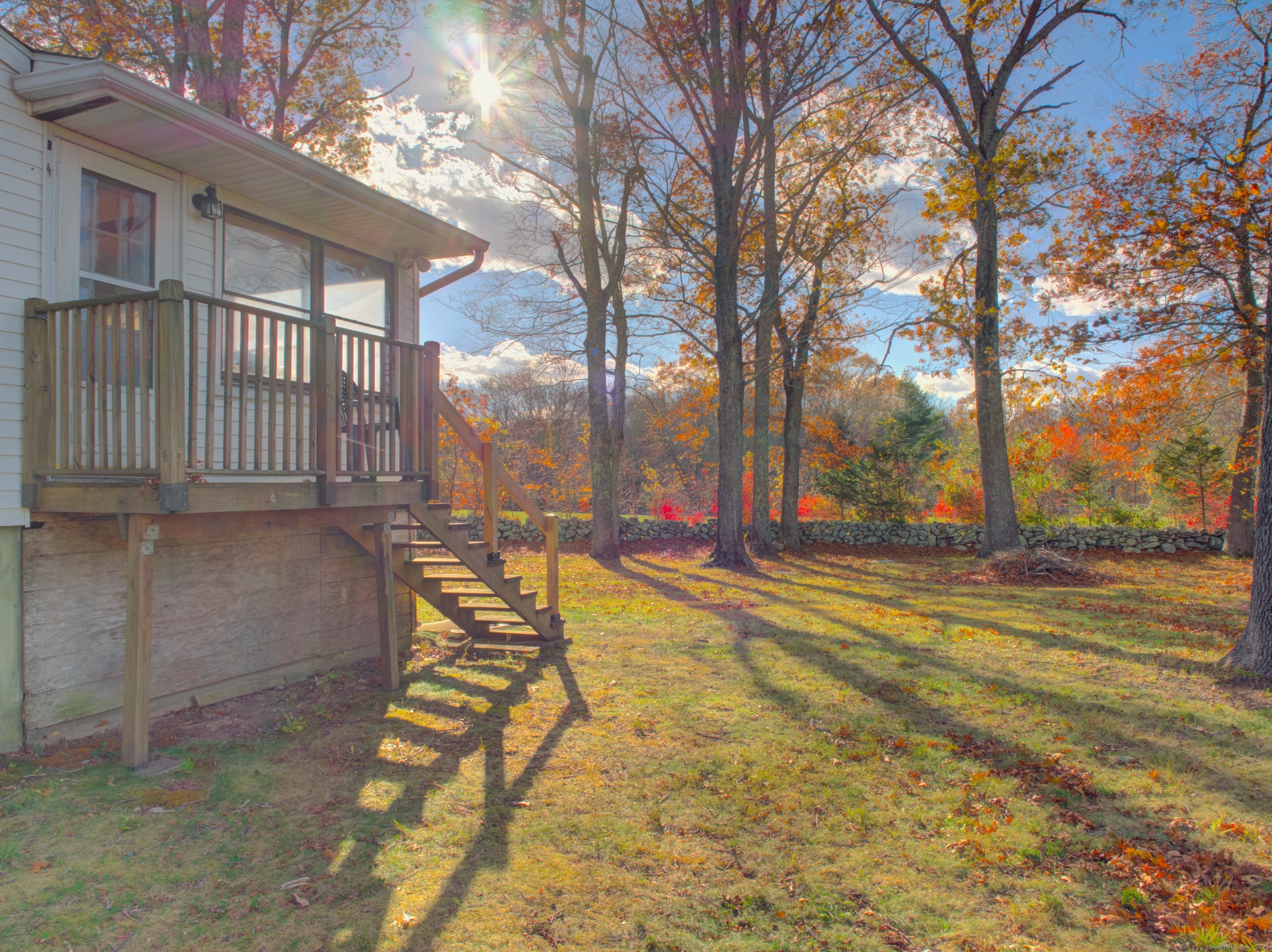 5 Sachem Lane Ledyard, CT 06339 - Photo 27 of 36 a view of a house with a yard and tree s