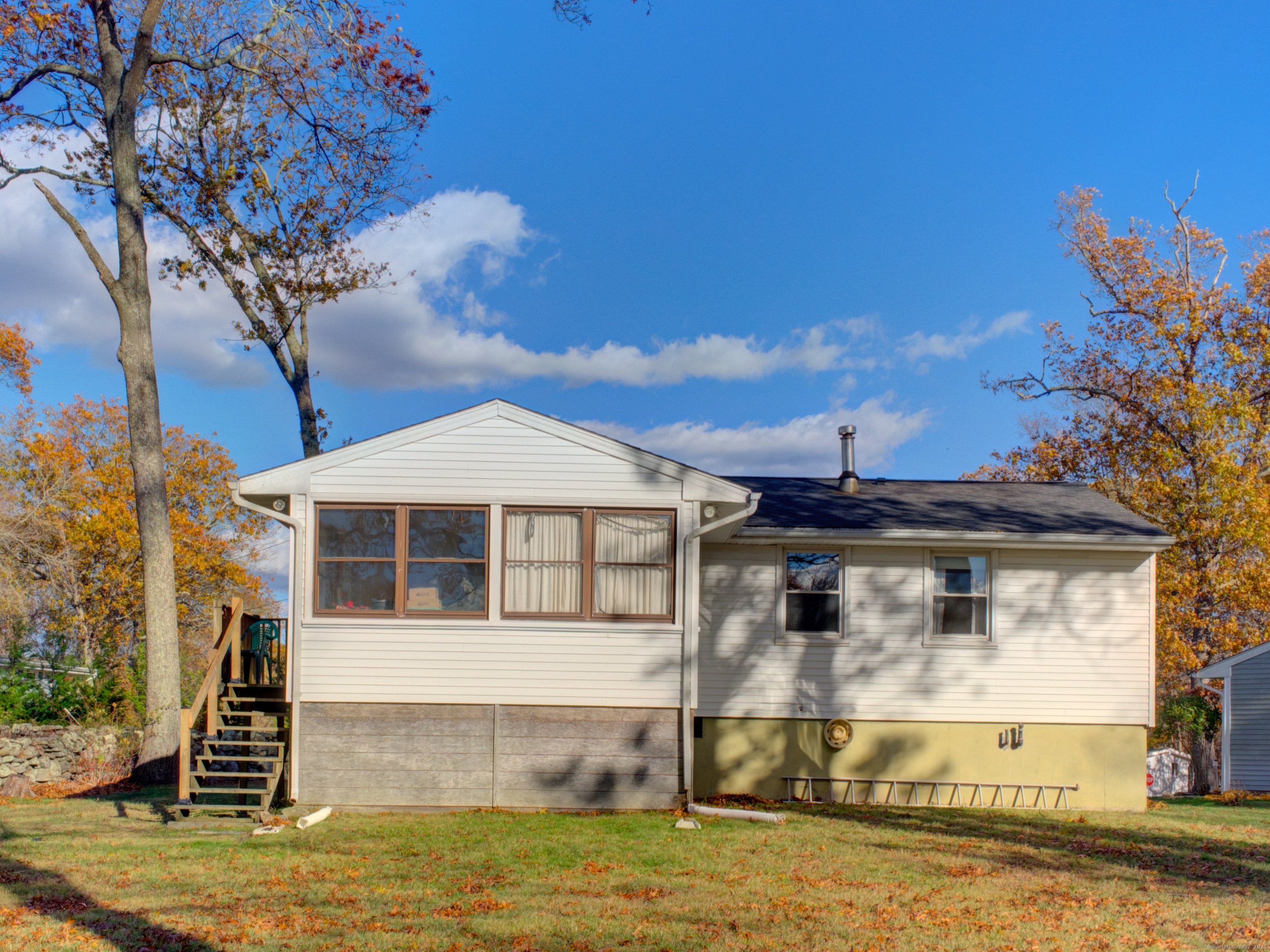 5 Sachem Lane Ledyard, CT 06339 - Photo 33 of 36 a front view of a house with a yard
