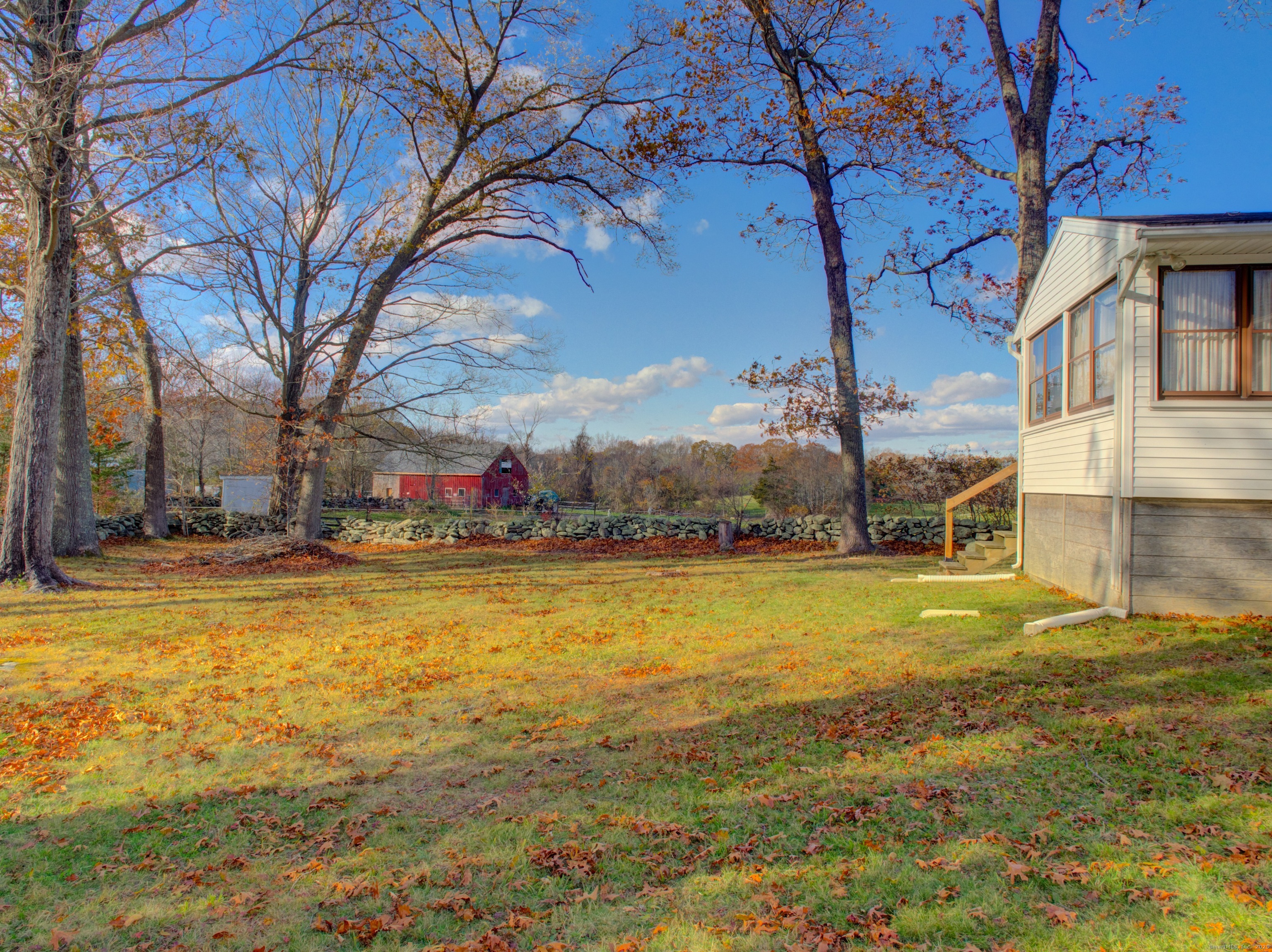 5 Sachem Lane Ledyard, CT 06339 - Photo 36 of 36 a swimming pool with outdoor seating and yard