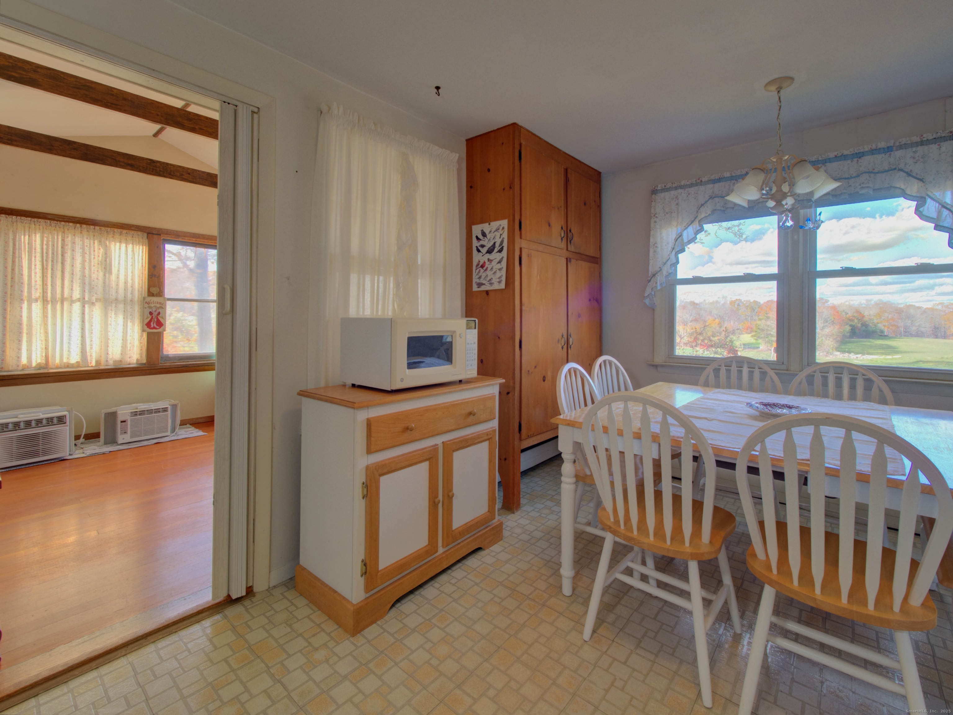 5 Sachem Lane Ledyard, CT 06339 - Photo 8 of 36 a view of a dining room with furniture window and outside view