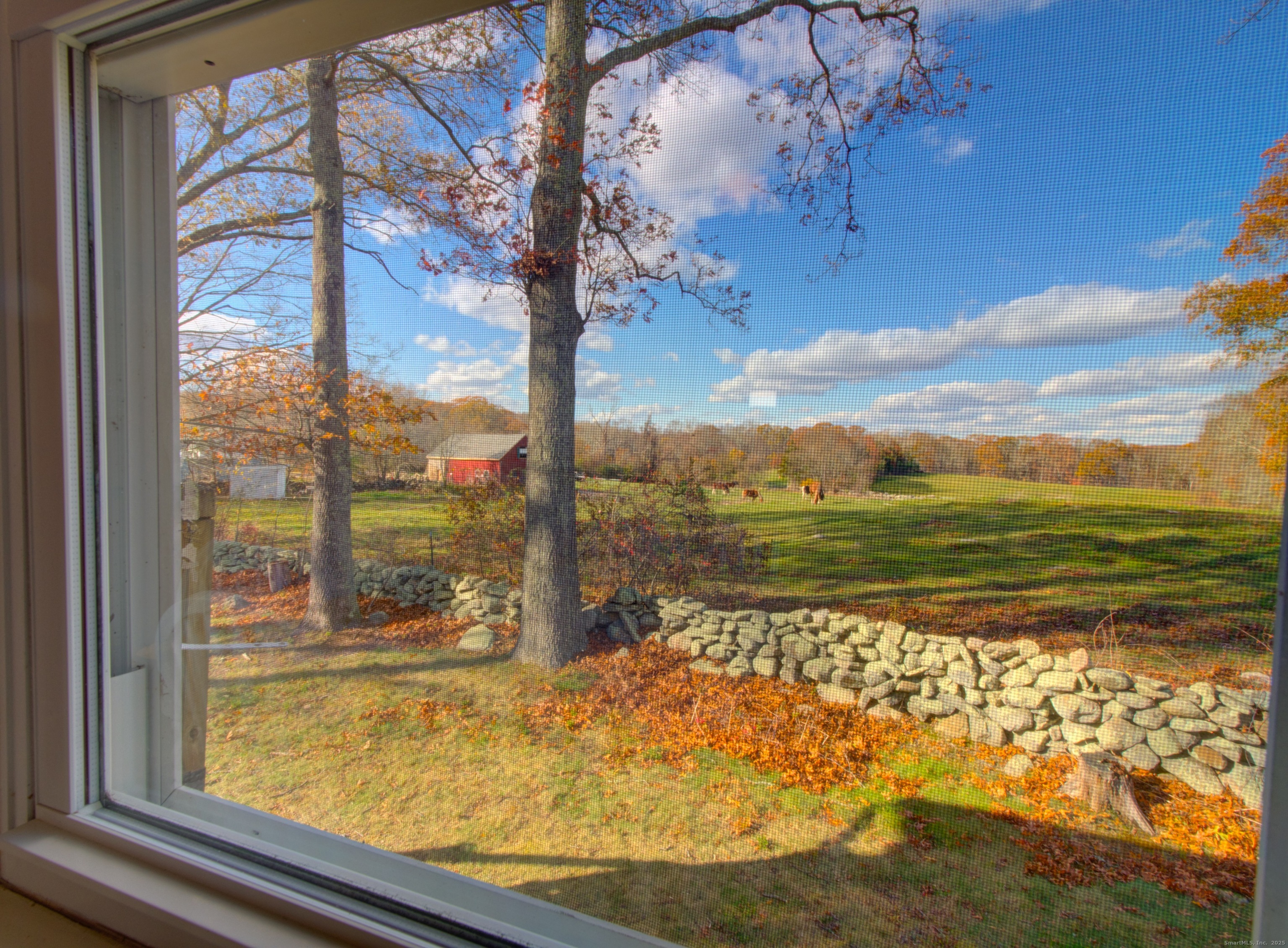 5 Sachem Lane Ledyard, CT 06339 - Photo 9 of 36 a view of a lake from a window
