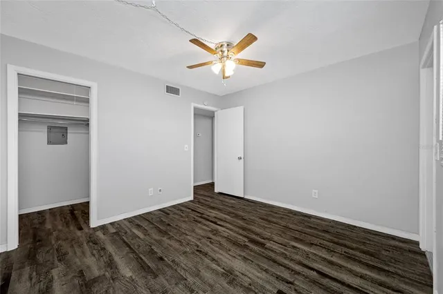 a view of a livingroom with a ceiling fan