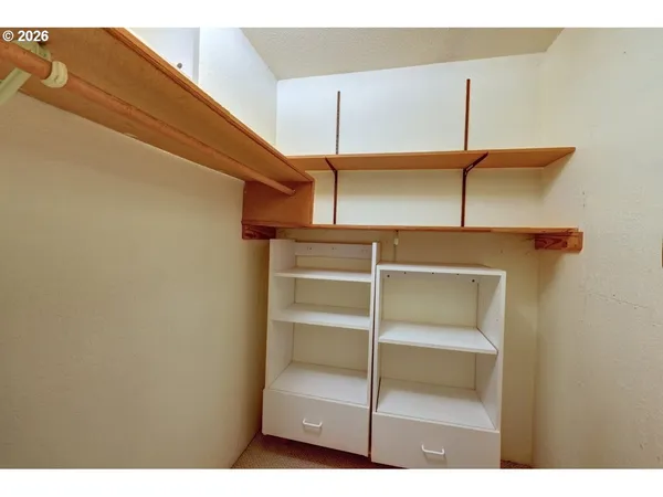 a view of a room with shelves