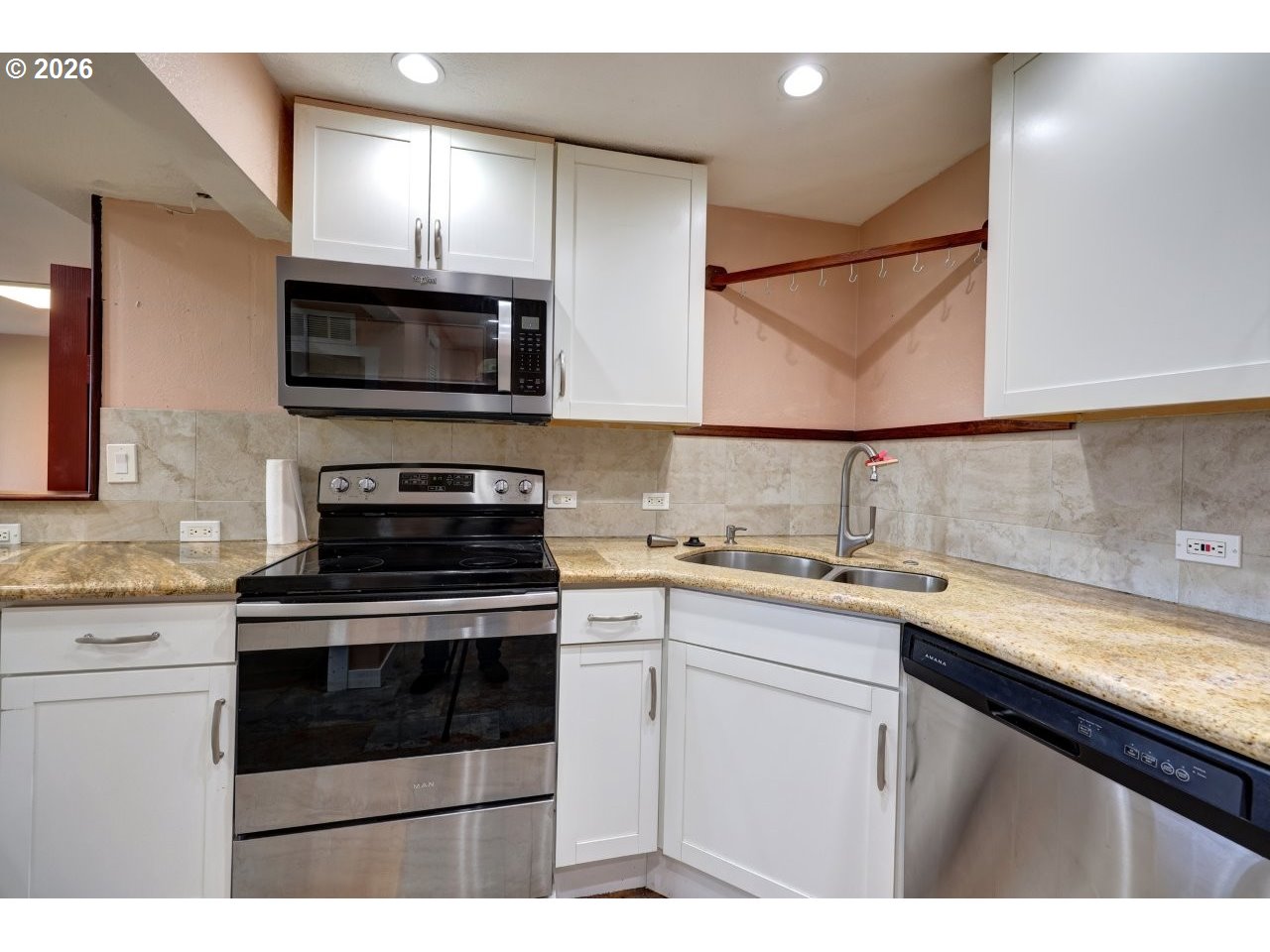 91828 Akerstedt Road Astoria, OR 97103 - Photo 27 of 48 a kitchen with a sink stove and microwave