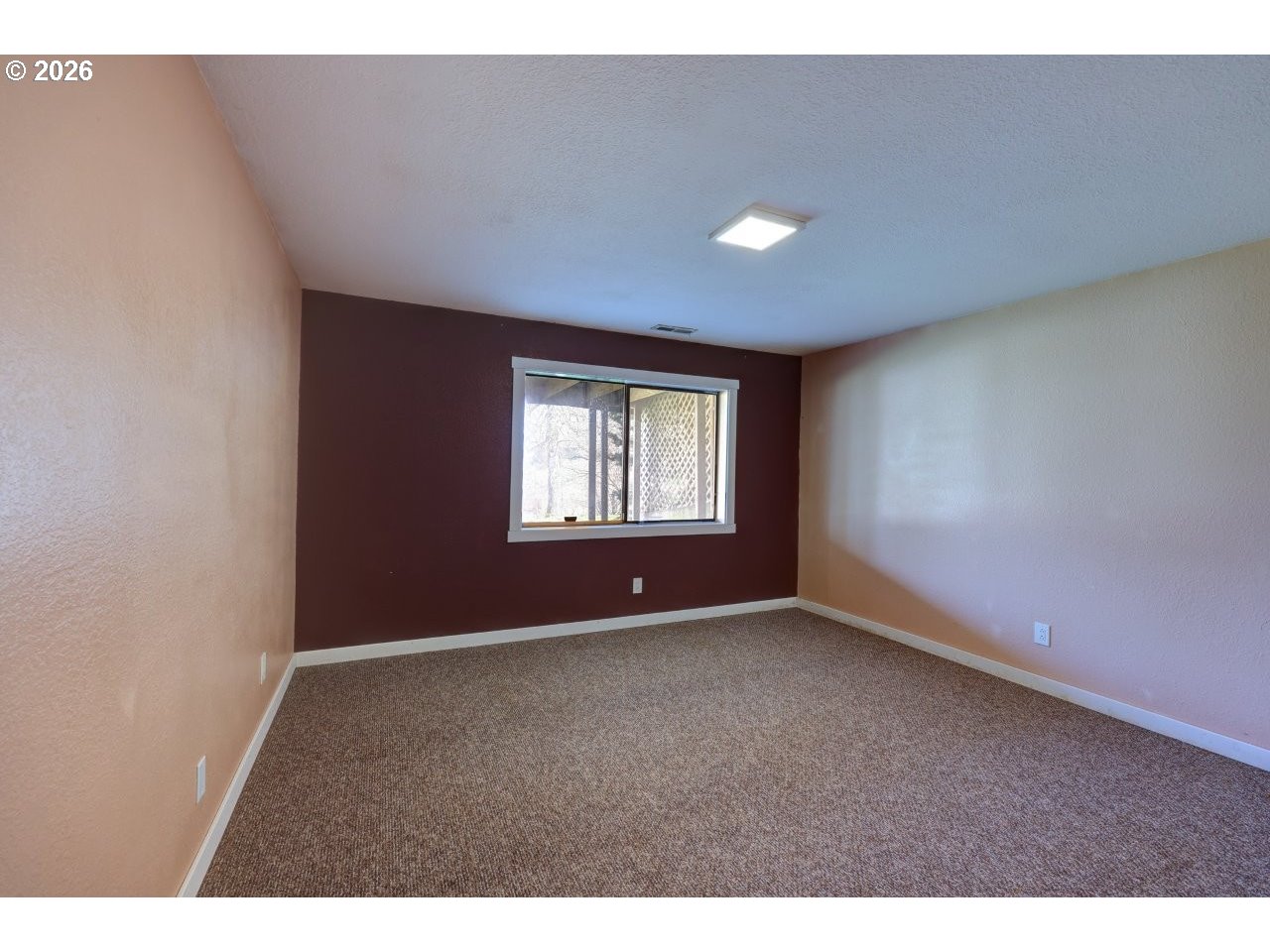 91828 Akerstedt Road Astoria, OR 97103 - Photo 32 of 48 a view of an empty room with a window