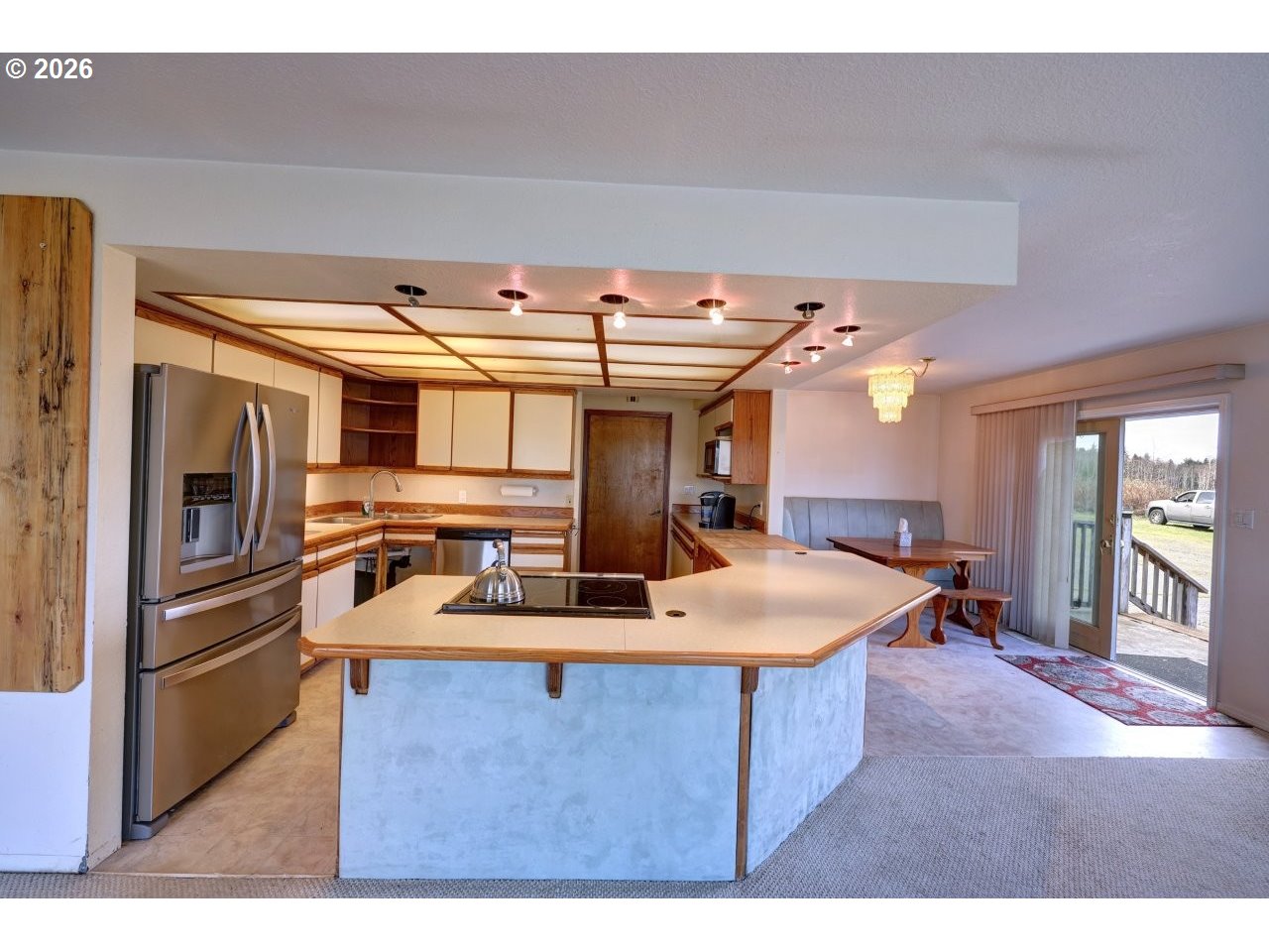 91828 Akerstedt Road Astoria, OR 97103 - Photo 5 of 48 a kitchen with kitchen island a sink stove and refrigerator