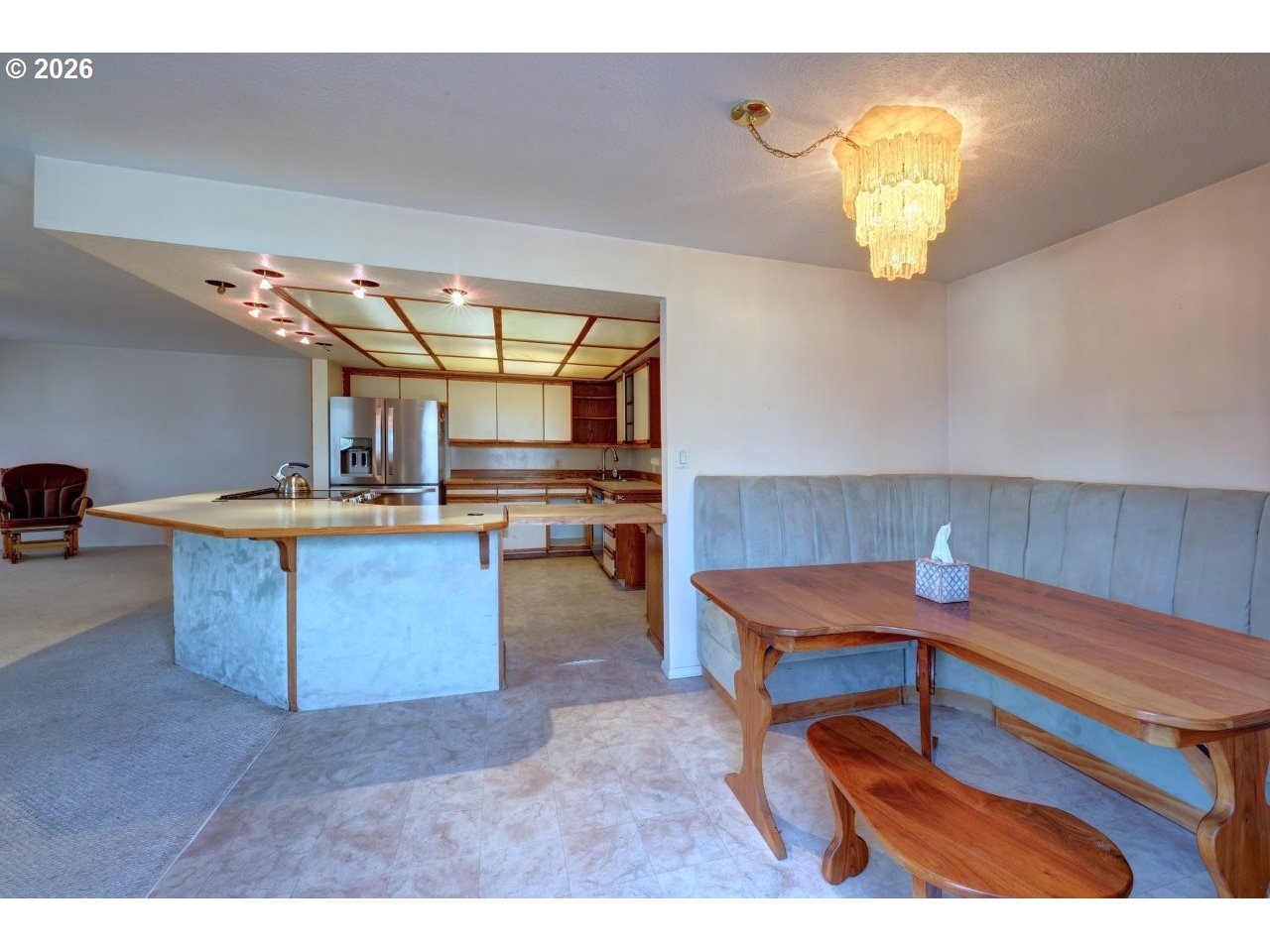 91828 Akerstedt Road Astoria, OR 97103 - Photo 6 of 48 a kitchen with a wooden table and chairs