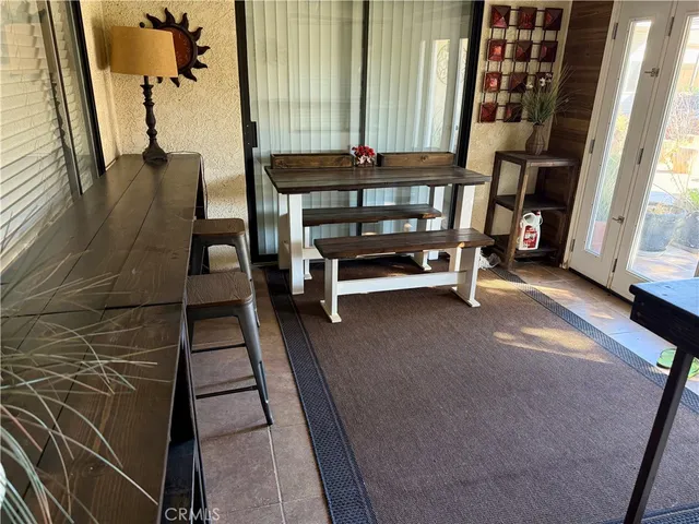 a view of livingroom with furniture and window