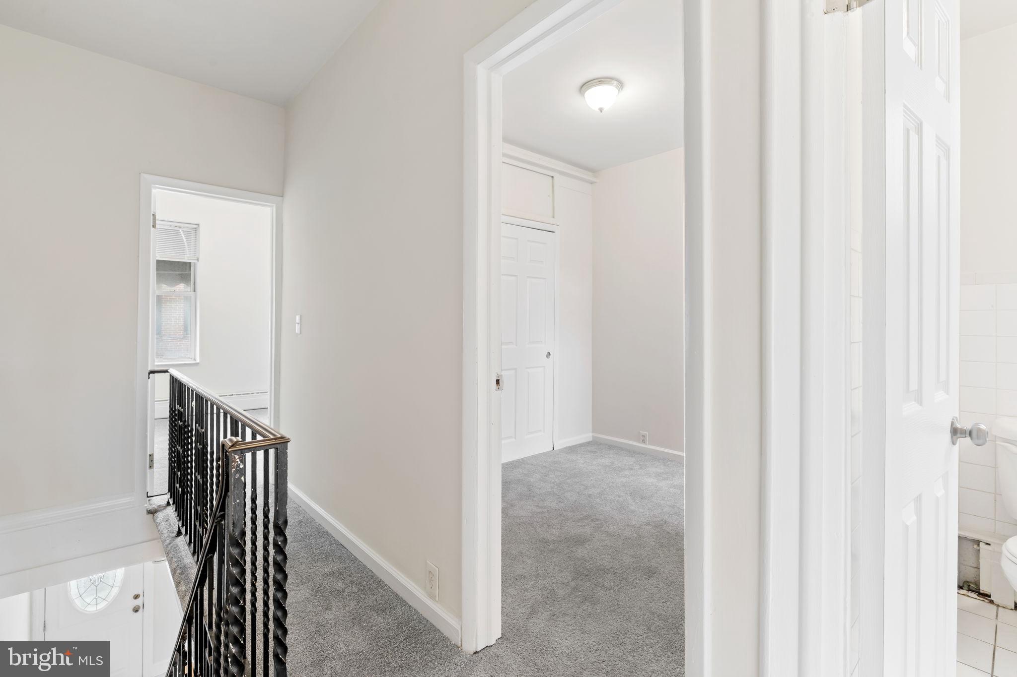 2246 South Hicks Street Philadelphia, PA 19145 - Photo 11 of 26 a view of a hallway with wooden floor and entryway