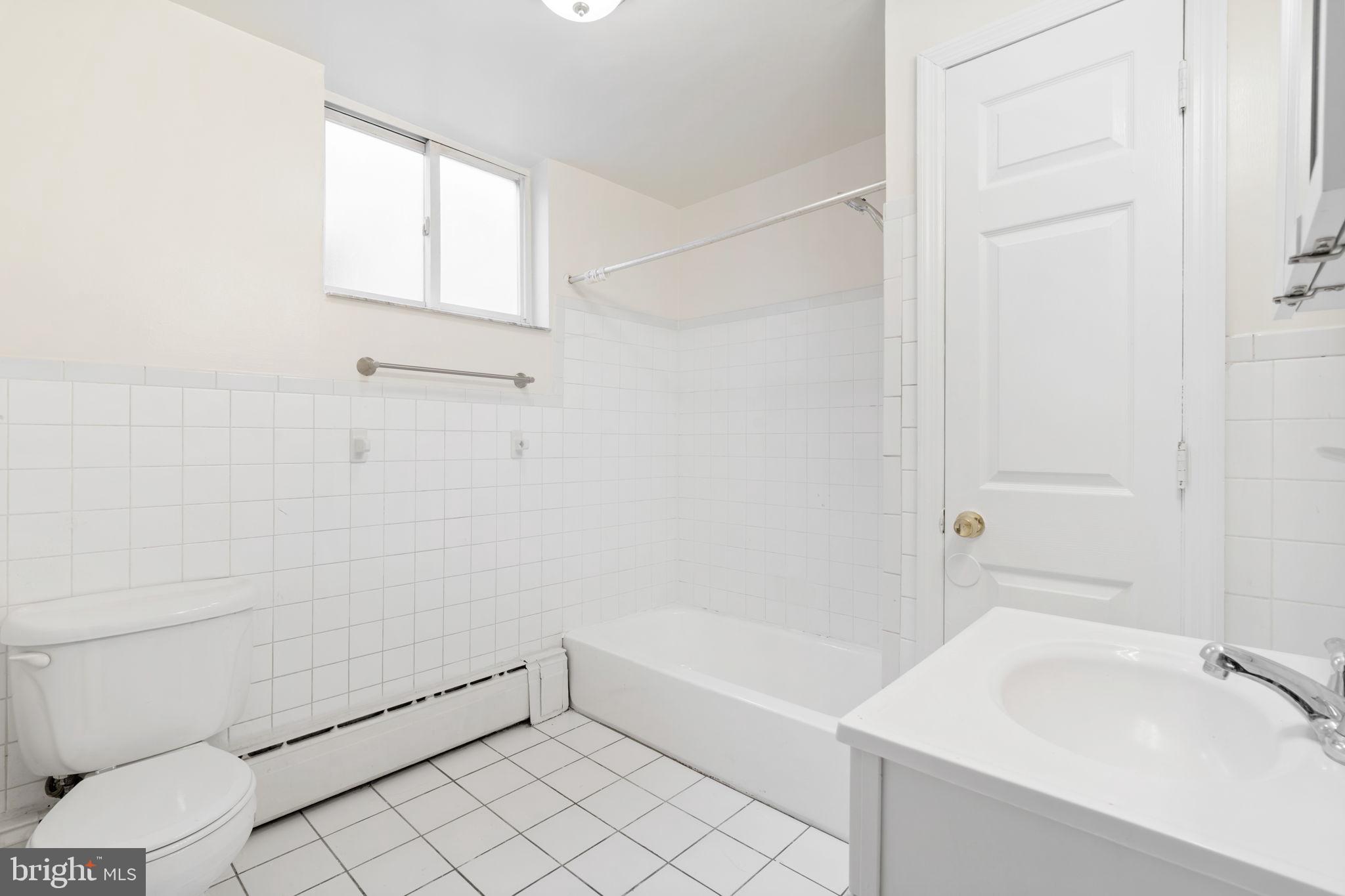 2246 South Hicks Street Philadelphia, PA 19145 - Photo 12 of 26 a bathroom with a bathtub and shower