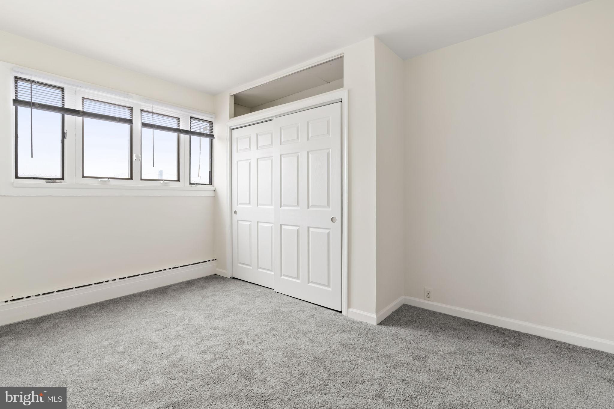 2246 South Hicks Street Philadelphia, PA 19145 - Photo 15 of 26 an empty room with windows