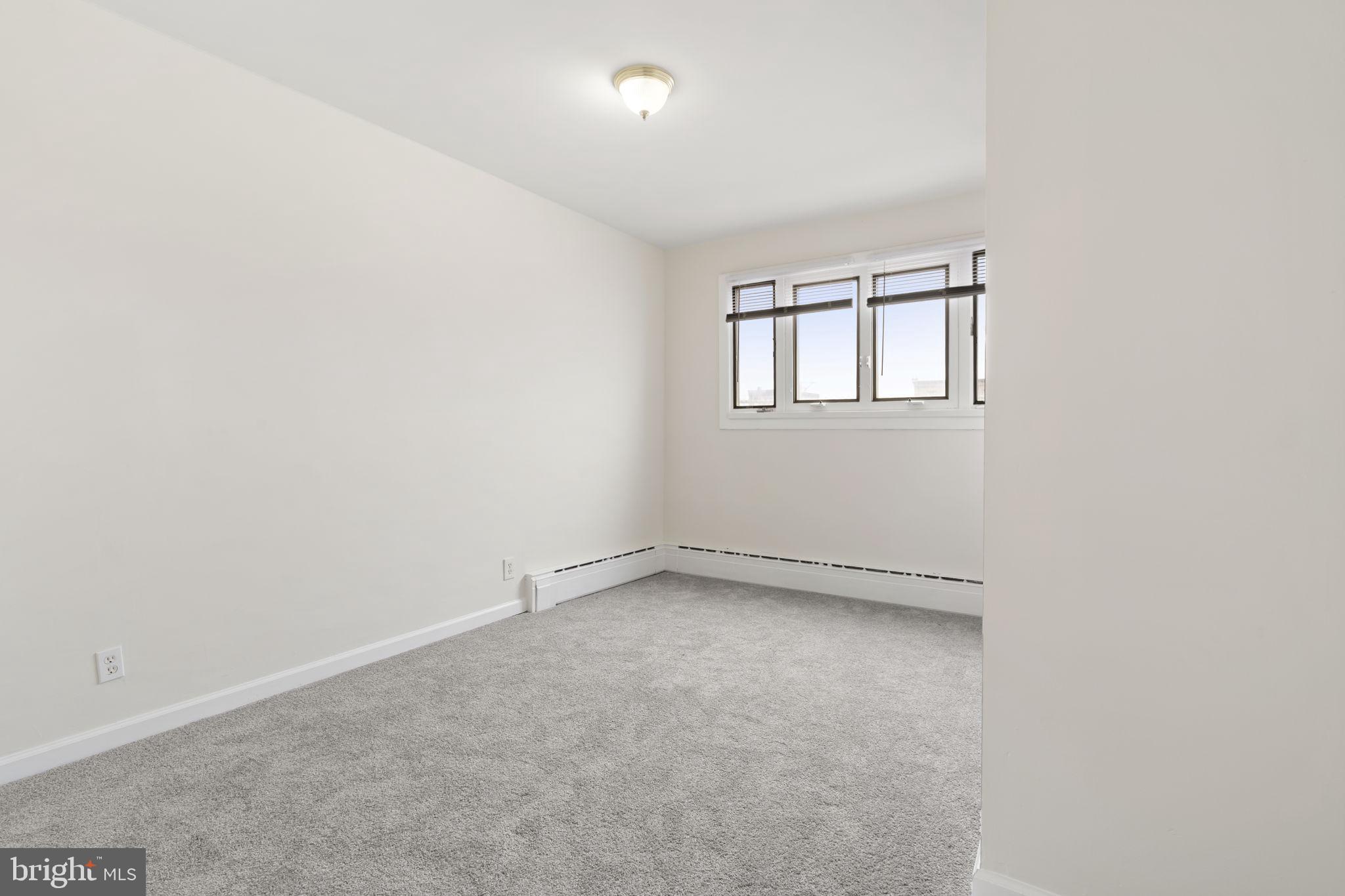 2246 South Hicks Street Philadelphia, PA 19145 - Photo 16 of 26 an empty room with a window