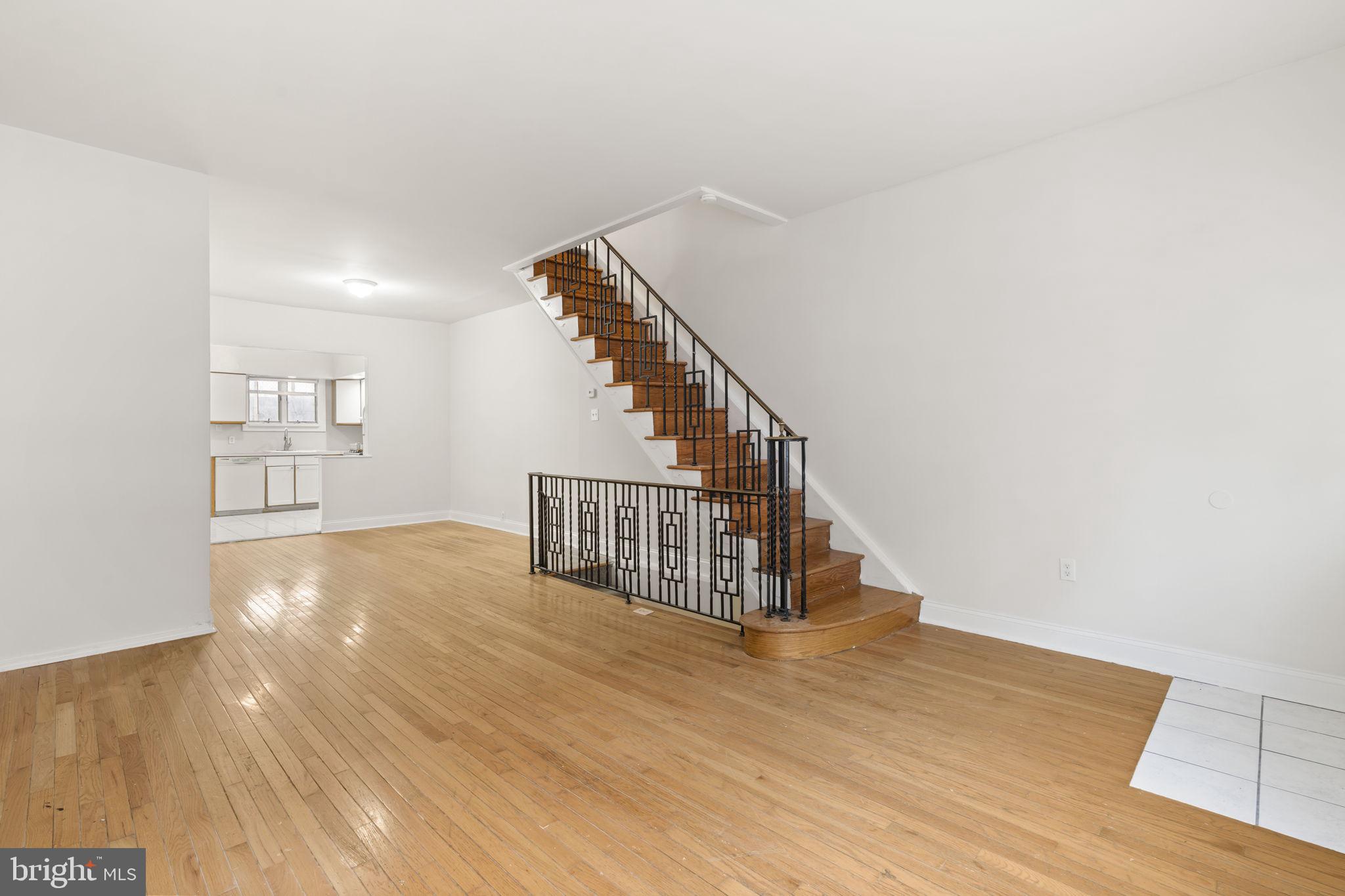 2246 South Hicks Street Philadelphia, PA 19145 - Photo 3 of 26 a view of entryway and hall with wooden floor