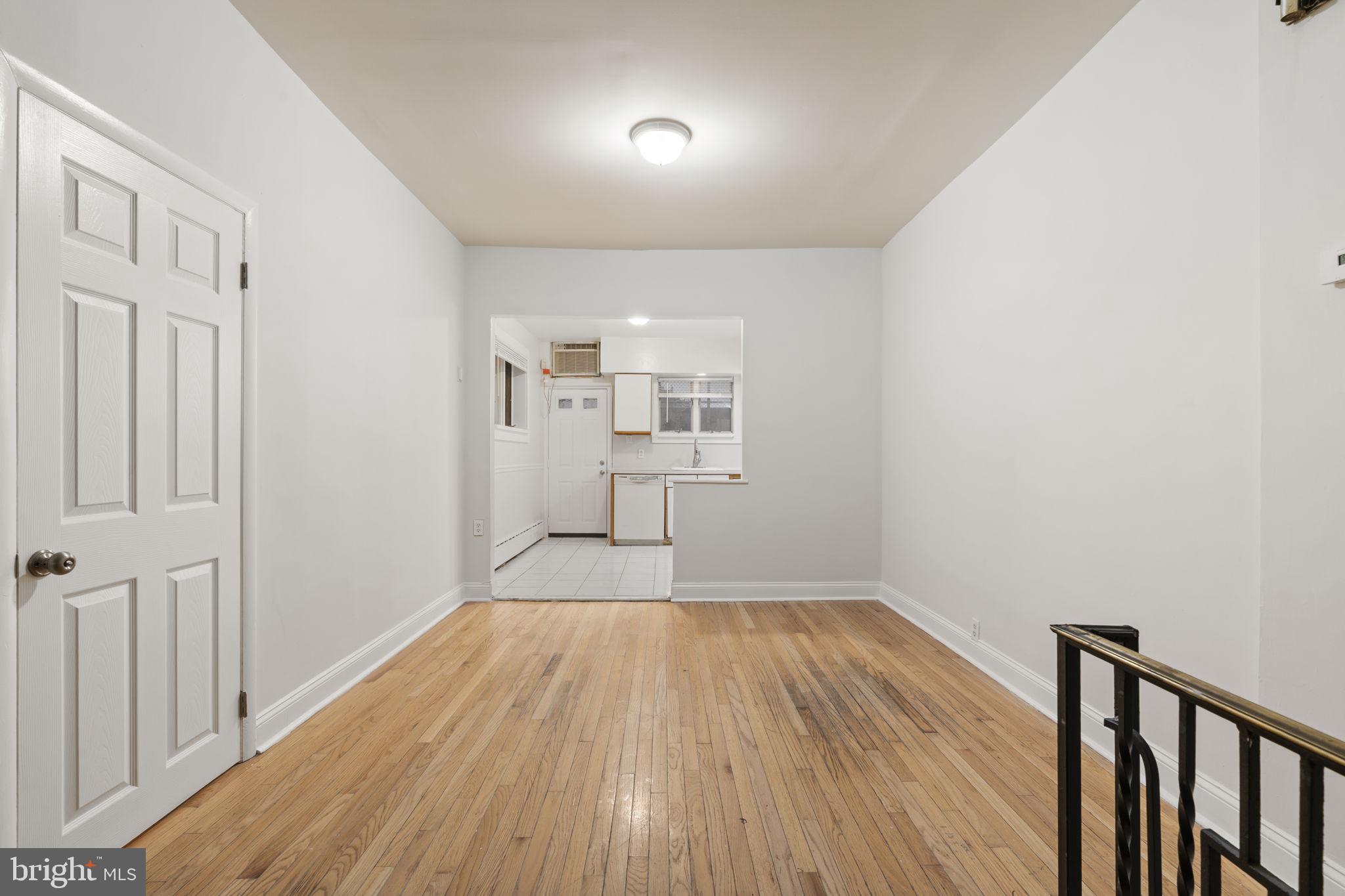 2246 South Hicks Street Philadelphia, PA 19145 - Photo 8 of 26 a view of empty room with wooden floor