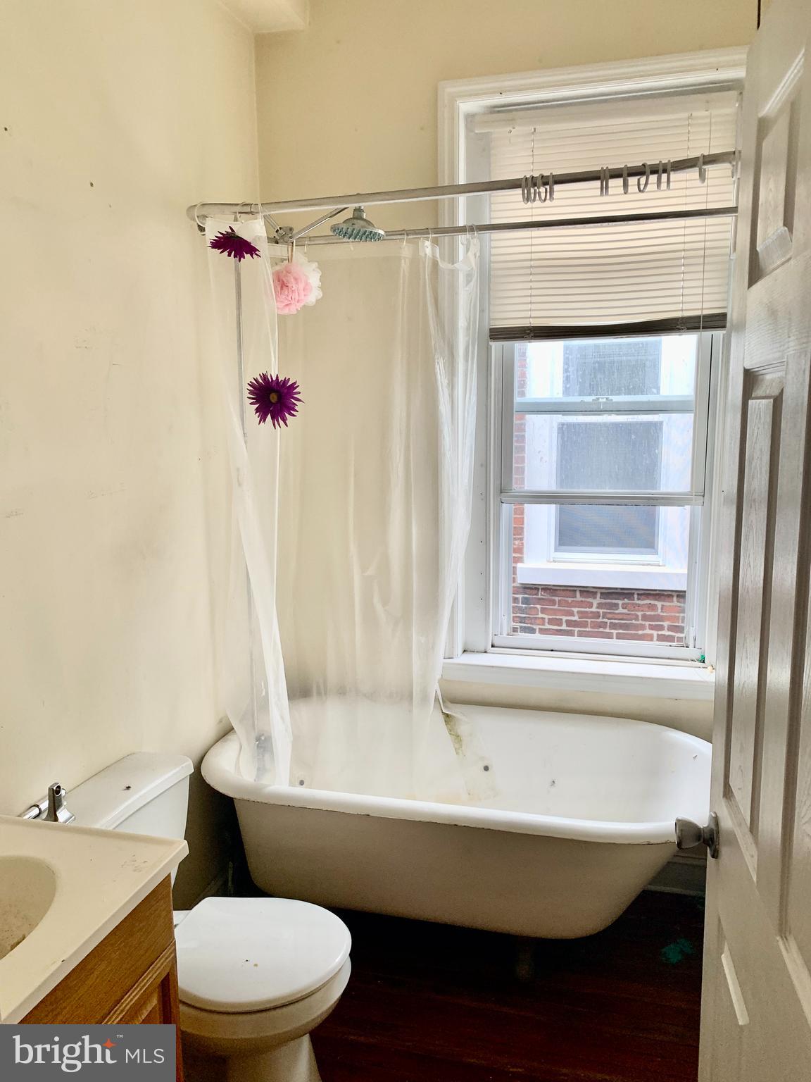 4217 Ridge Avenue, Unit 3 Philadelphia, PA 19129 - Photo 14 of 16 a bathroom with a sink and a toilet