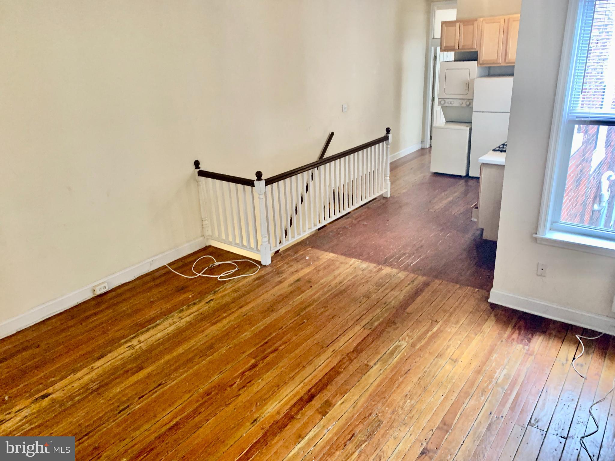 4217 Ridge Avenue, Unit 3 Philadelphia, PA 19129 - Photo 4 of 16 a view of a room with wooden floor and staircase