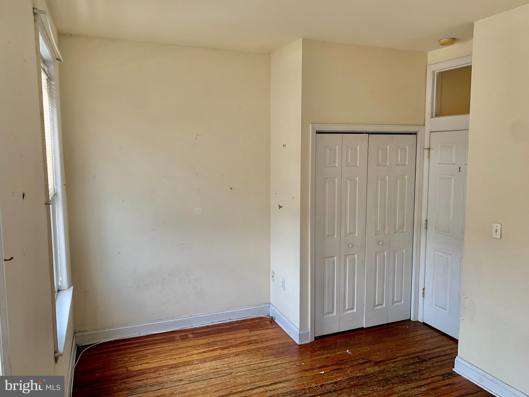 4217 Ridge Avenue, Unit 3 Philadelphia, PA 19129 - Photo 9 of 16 a view of empty room with wooden floor