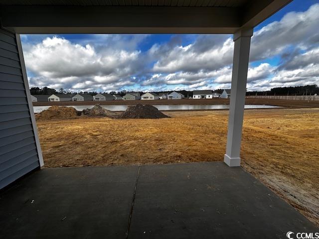 669 Castillo Drive Loris, SC 29569 - Photo 13 of 14 View of yard featuring a patio area