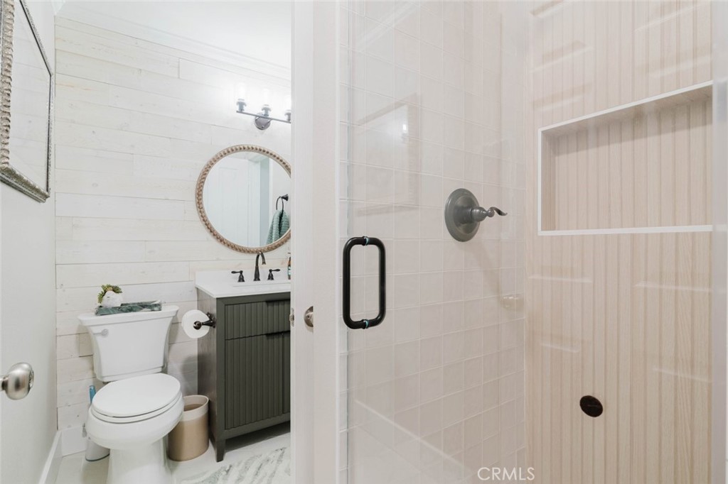 32480 The Old Road Castaic, CA 91384 - Photo 13 of 68 a bathroom with a toilet sink and shower