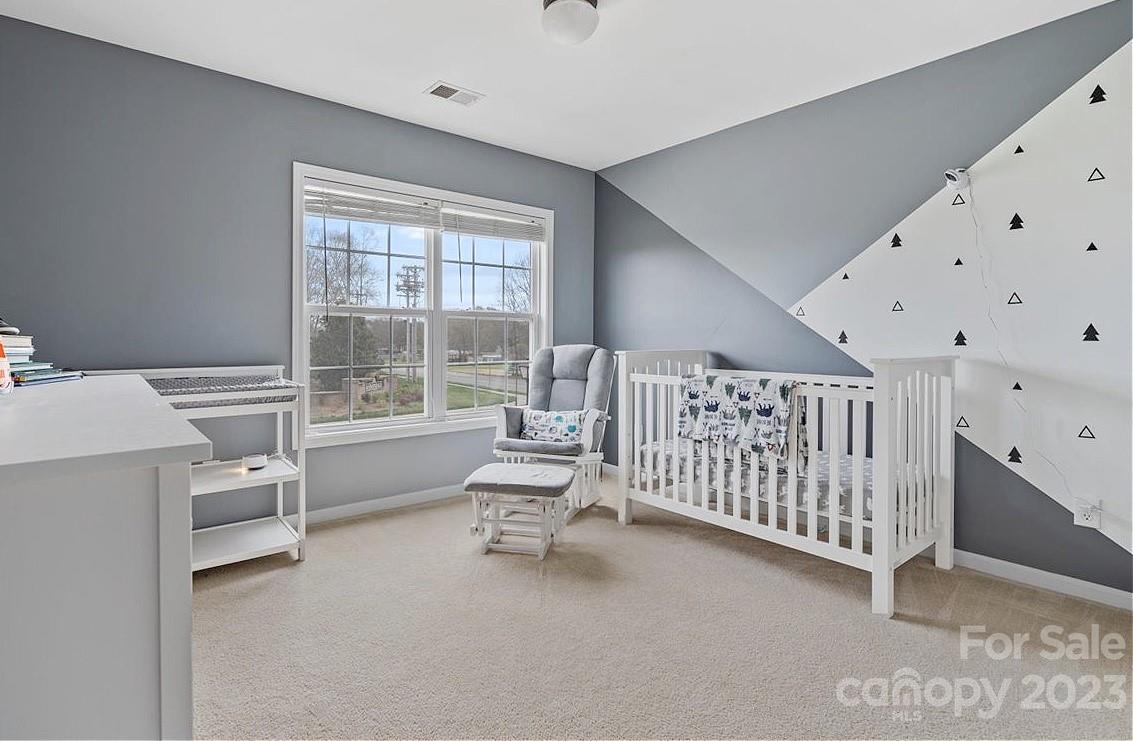 3004 Potomac Road Indian Trail, NC 28079 - Photo 14 of 31 a bedroom with furniture and white walls
