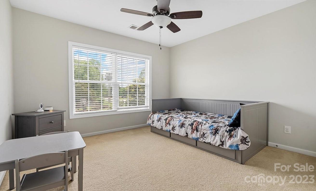 3004 Potomac Road Indian Trail, NC 28079 - Photo 15 of 31 a bedroom with bed and window