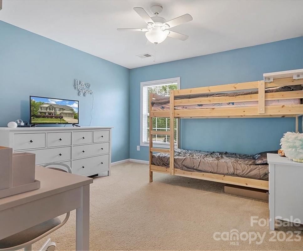 3004 Potomac Road Indian Trail, NC 28079 - Photo 16 of 31 a bedroom with a bed and furniture