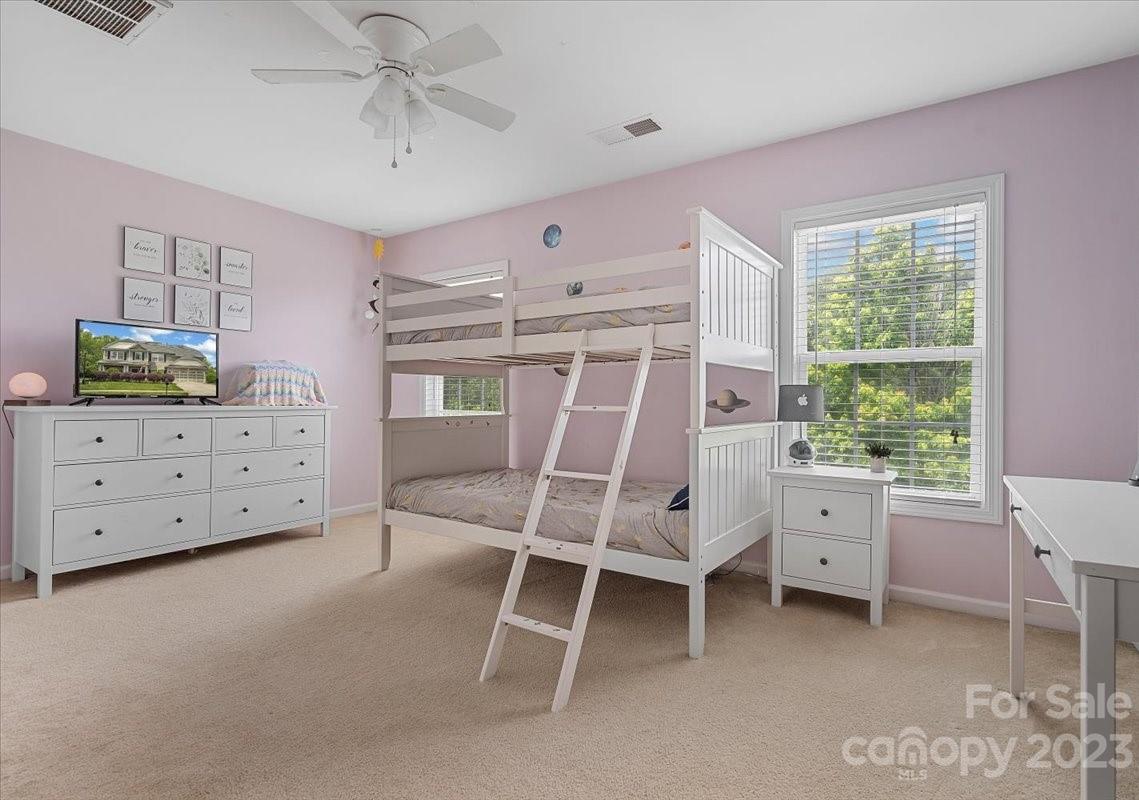 3004 Potomac Road Indian Trail, NC 28079 - Photo 17 of 31 a bedroom with a bed and a window