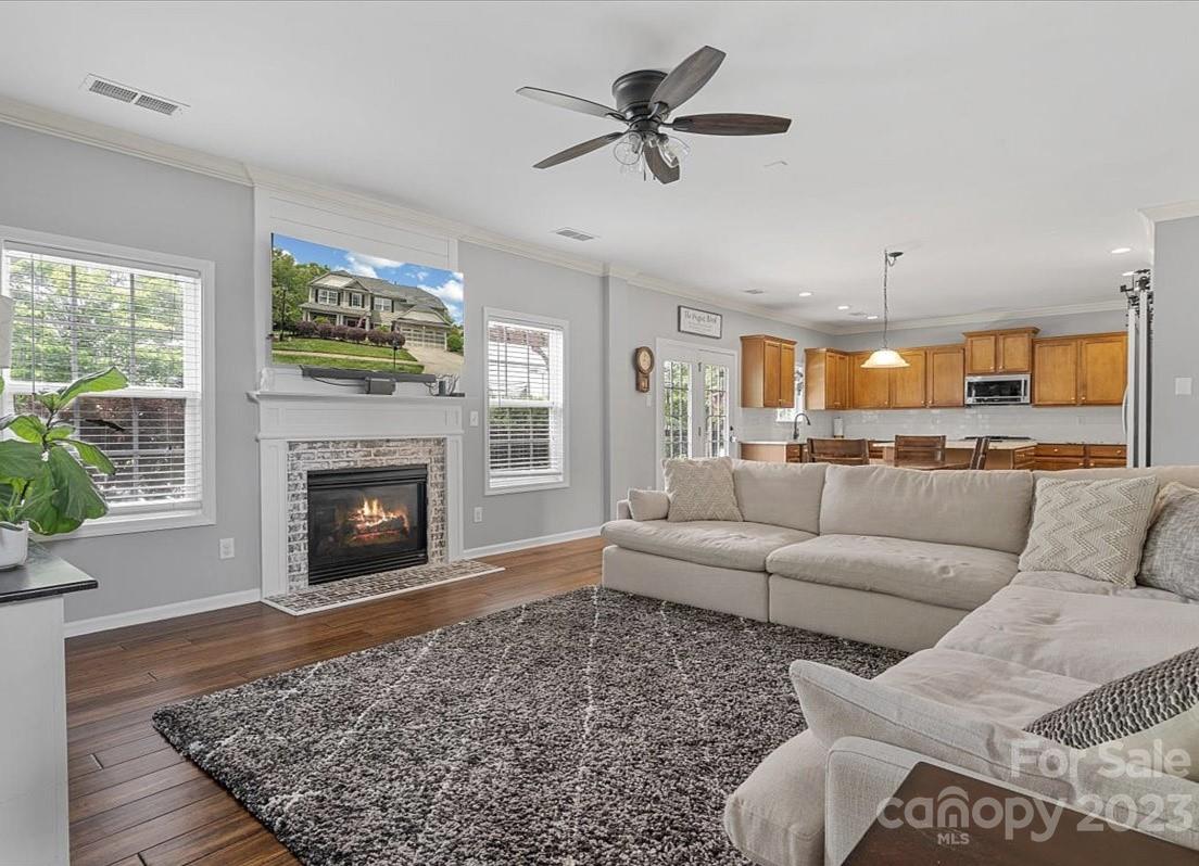 3004 Potomac Road Indian Trail, NC 28079 - Photo 2 of 31 a living room with furniture and a fireplace