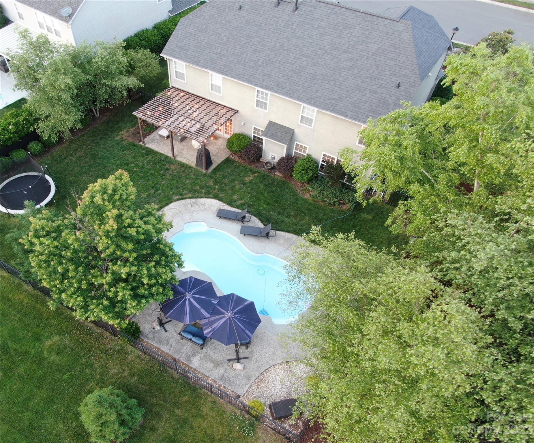 3004 Potomac Road Indian Trail, NC 28079 - Photo 23 of 31 an aerial view of a house with a yard and lake view