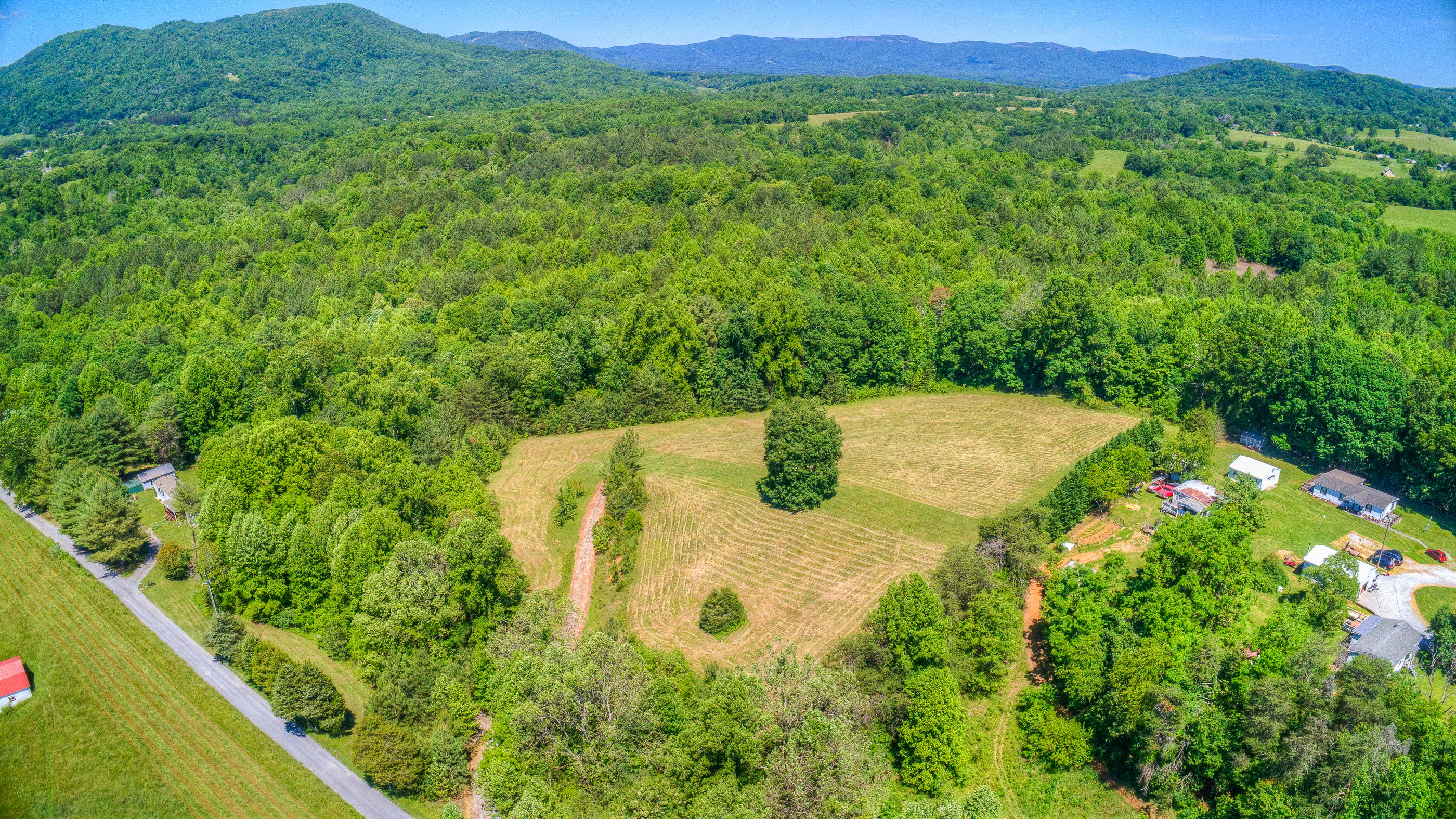 0 Foster Road Thaxton, VA 24174 - Photo 3 of 10 a view of a large body of water with a mountain view