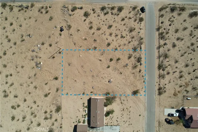 a view of a road with a building in the background