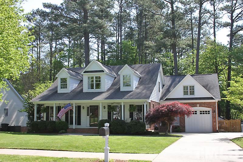 6308 Wynbrook Way Raleigh, NC 27612 - Photo 1 of 21 front view of a house with a yard