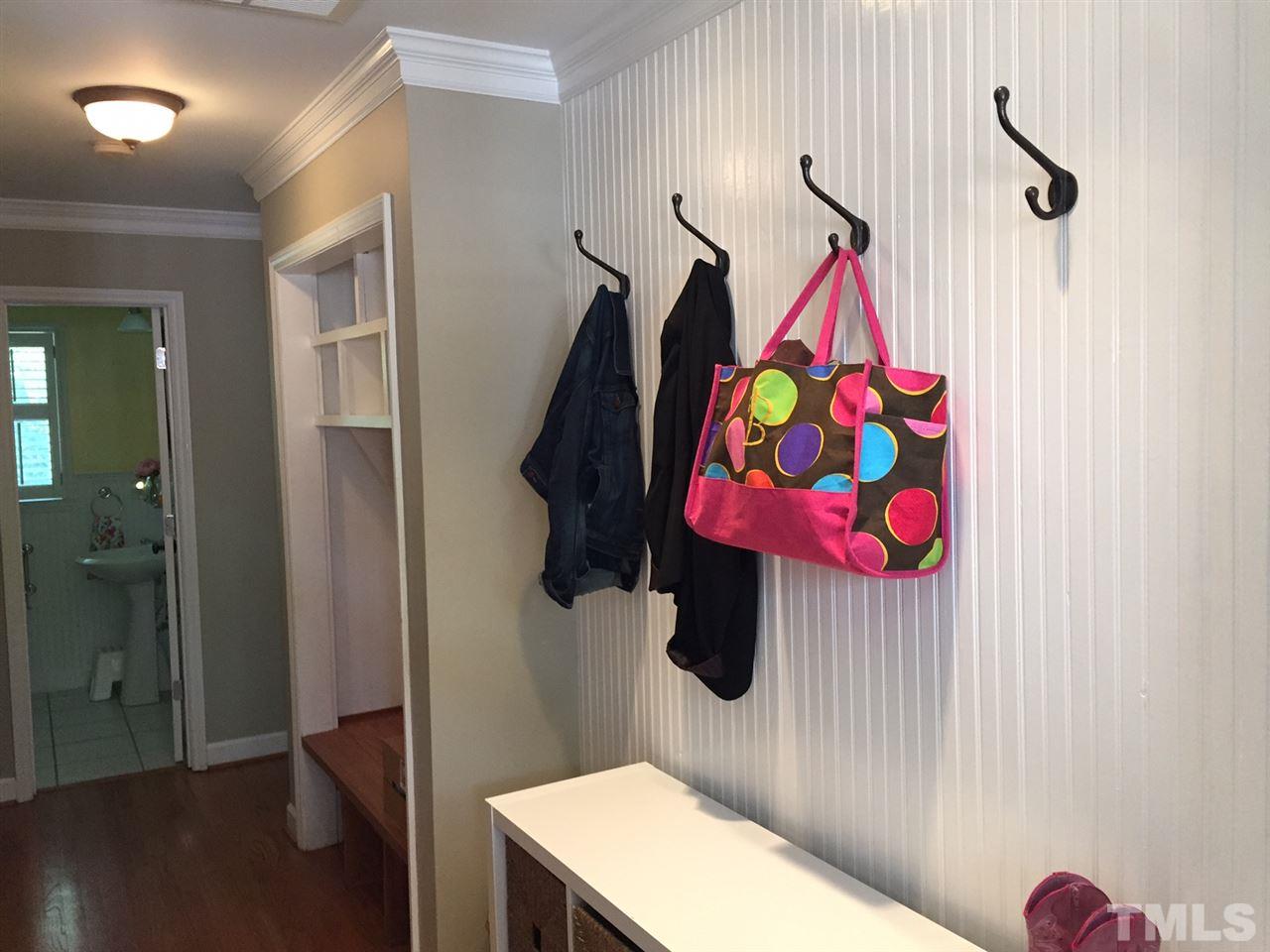 6308 Wynbrook Way Raleigh, NC 27612 - Photo 11 of 21 a bathroom with a sink vanity mirror and tub