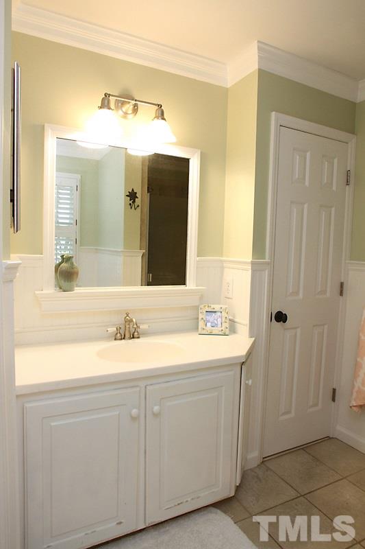 6308 Wynbrook Way Raleigh, NC 27612 - Photo 15 of 21 a bathroom with a double vanity sink mirror and