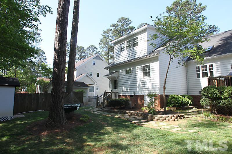 6308 Wynbrook Way Raleigh, NC 27612 - Photo 21 of 21 a view of a house with backyard and sitting area