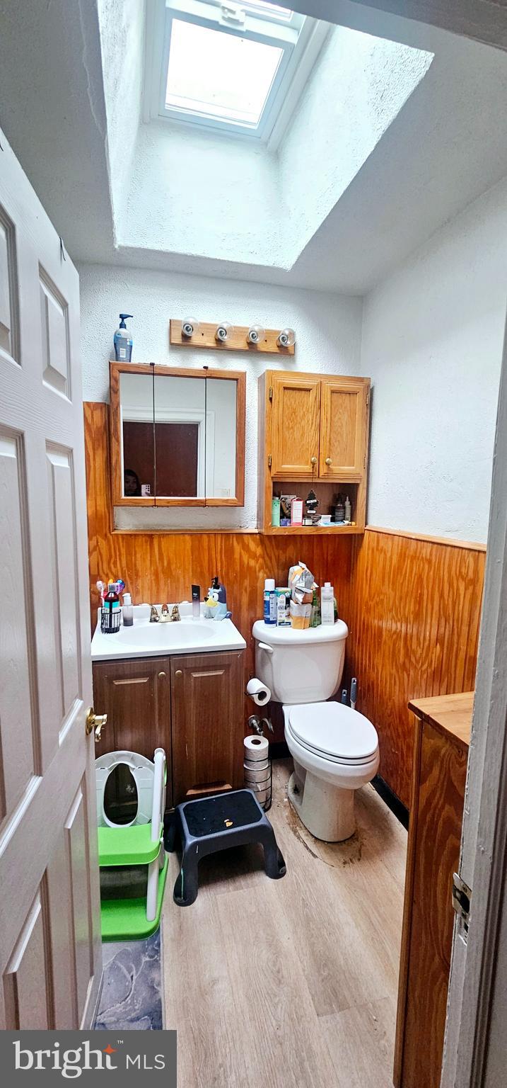 2779 North Congress Road Camden, NJ 08104 - Photo 11 of 21 a bathroom with a toilet and a washing machine