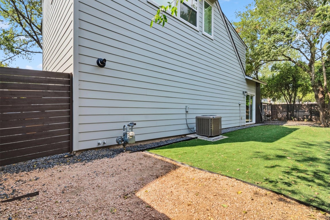 5609 Tura Lane, Unit A Austin, TX 78721 - Photo 34 of 39 a view of a backyard with a garden