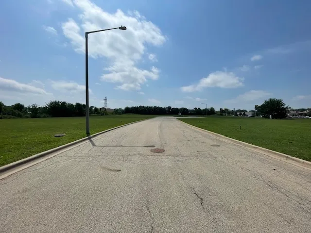 a view of a lake with a big yard