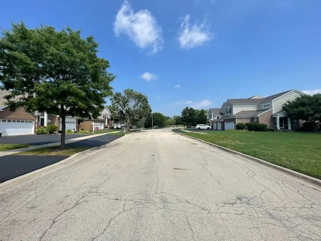 a view of road with yard