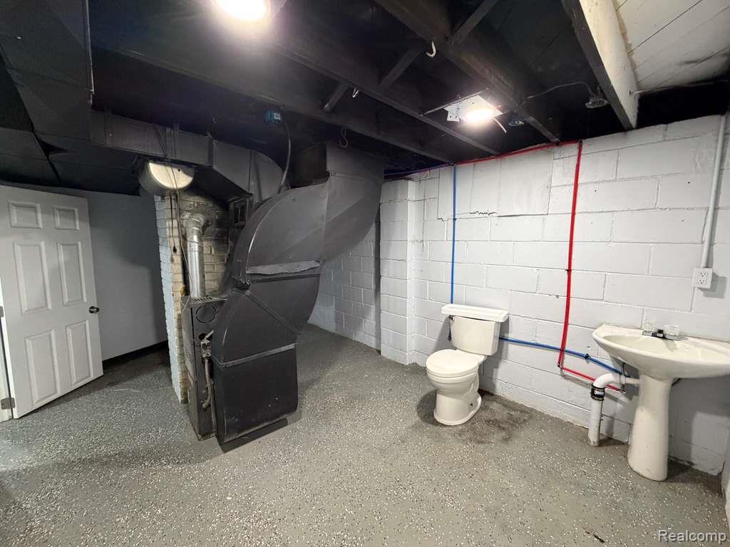 7416 Heyden Detroit, MI 48228 - Photo 16 of 16 Unfinished below grade area featuring heating unit